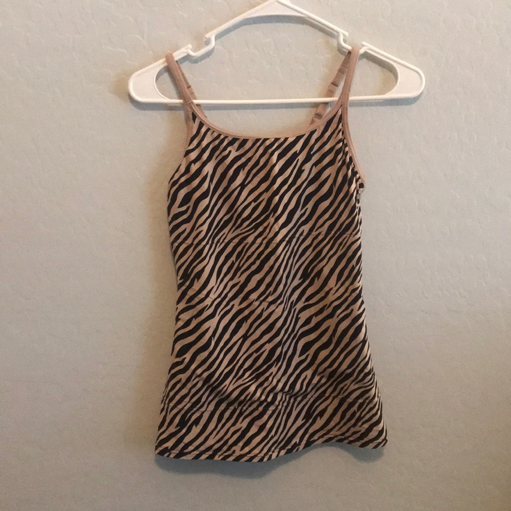 Three spanx type cami’s, size large.